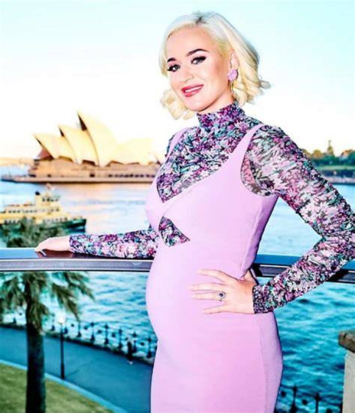 Pregnant Katy Perry Carries Mystery Object In Her Dress As Her Bump Continues To Grow