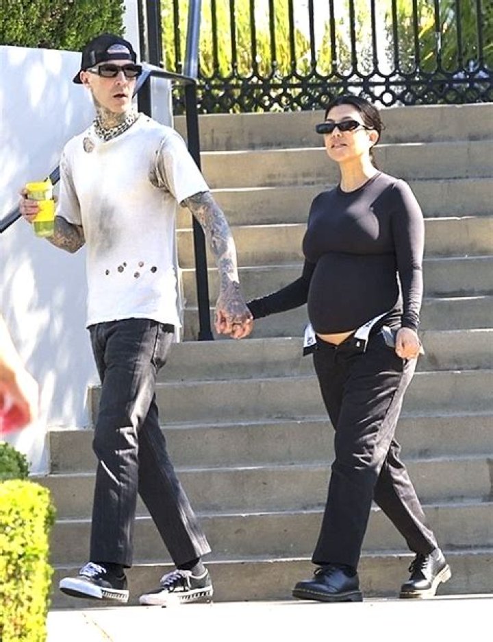 Pregnant Kourtney Kardashian Leaves Jeans Unbuttoned For Morning Stroll with Travis Barker