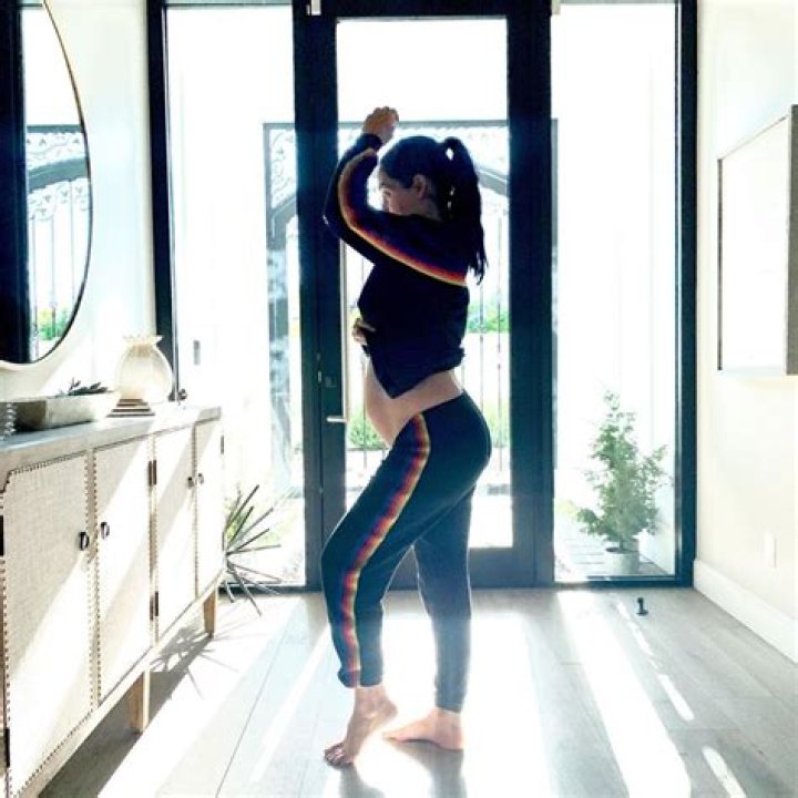 Pregnant Nikki Bella Shows Off Her ’30-Week’ Baby Bump Posing In Her Massive Walk-In Closet