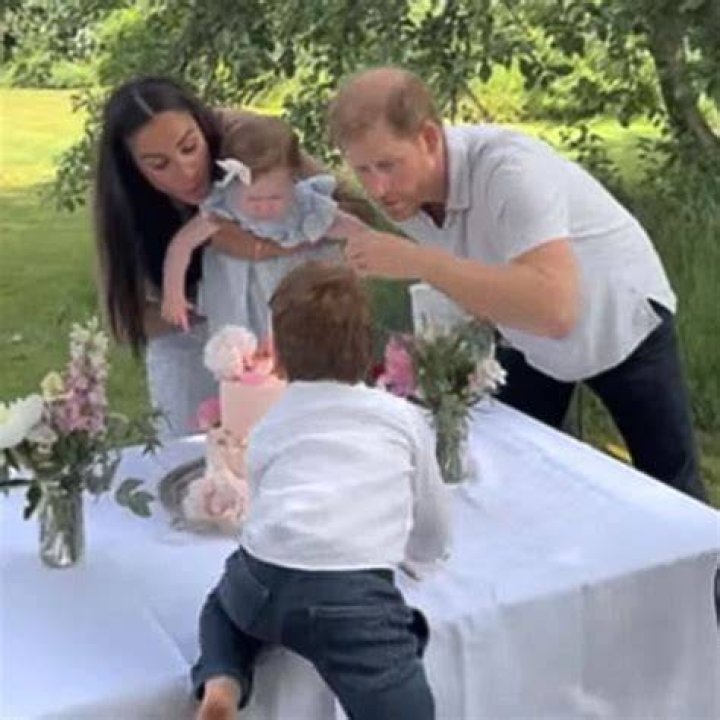 Prince Charles & Camilla Spotted With A Photo Of Prince Harry & Meghan Markle’s Wedding In Home