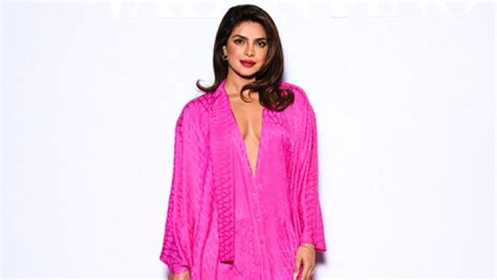 Priyanka Chopra Stuns In Plunging Pink Outfit As She Matches Nick Jonas At Paris Fashion Week