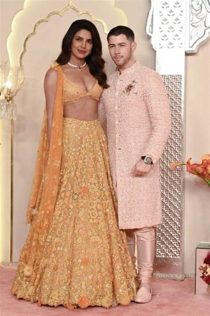 Priyanka Chopra Wears Daring Front Slit Blouse & PDAs With Nick Jonas On The BAFTAs Red Carpet — Pics