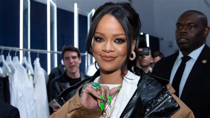 Rihanna Stuns On ‘Vogue’ Cover In Sheer Coat & Admits She ‘Absolutely’ Turned Down Super Bowl Halftime