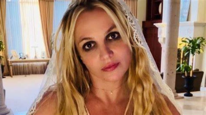 Rita Ora Channels Britney Spears In Sheer Sequined Mesh Top For Sexy New Photo