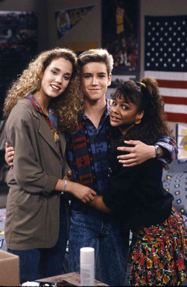 ‘Saved By The Bell’s Elizabeth Berkley, Tiffani Thiessen, & Lark Voorhies Reunite For The 1st Time In 30 Years