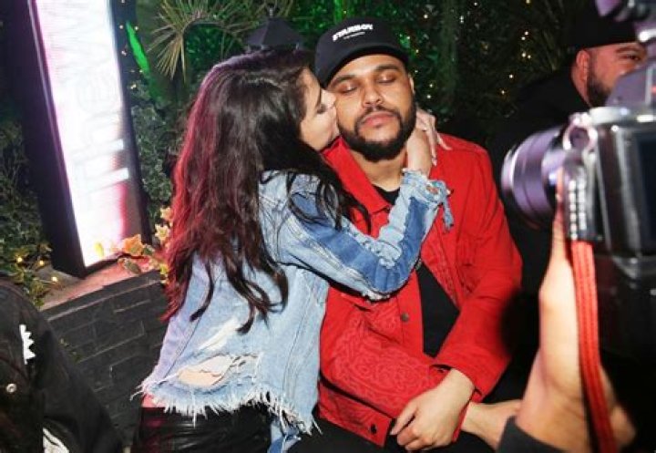 Selena Can’t Stop Hugging The Weeknd While He Wears Surgical Mask At Coachella