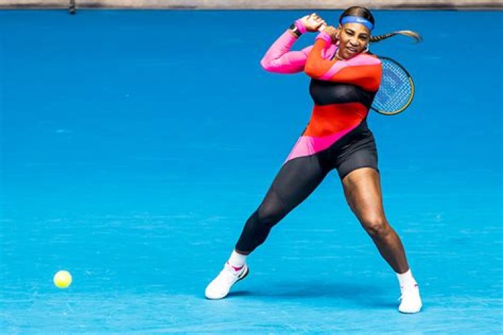Serena Williams Stuns In One-Legged Pink & Red Catsuit At Australian Open