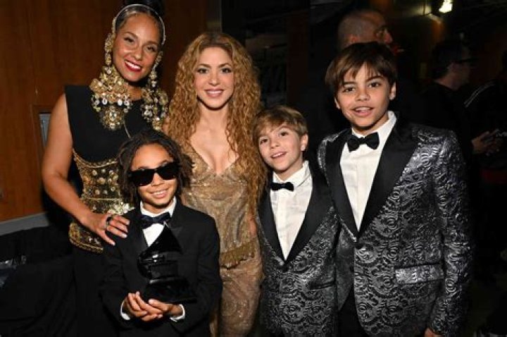 Shakira Smiles On Vacation In Rome With Sons Sasha, 7, & Milan, 9, As They Take Goofy Photos