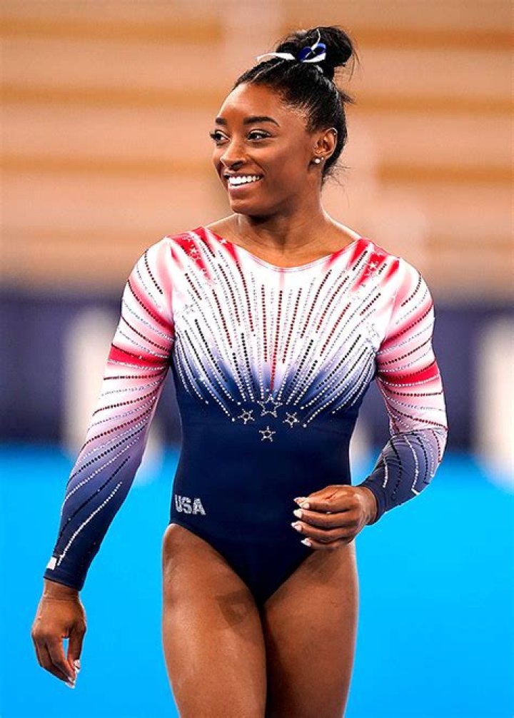 Simone Biles Rocks Blue Bikini In Beach Photos – Hollywood Life