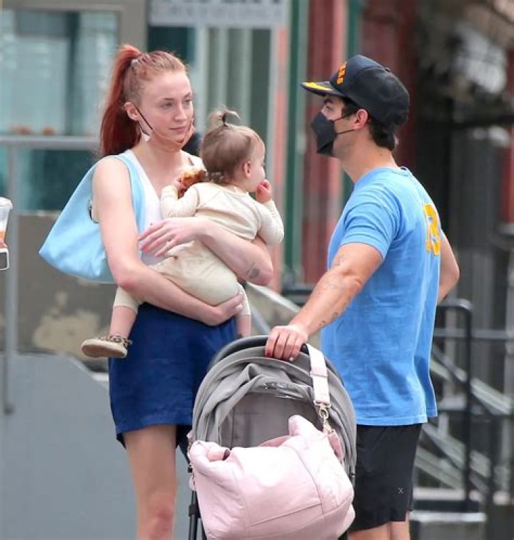 Sophie Turner Looks Ready For Baby’s Arrival in Pretty Pink Jumper With Joe Jonas