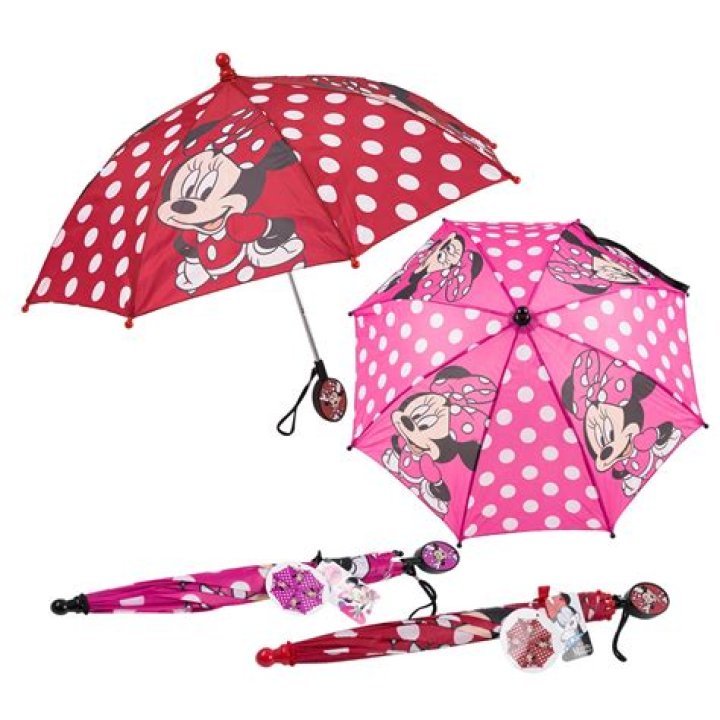 Stormi Webster, 2, Looks Adorable In A Floral Dress While Holding A Pink Minnie Mouse Umbrella