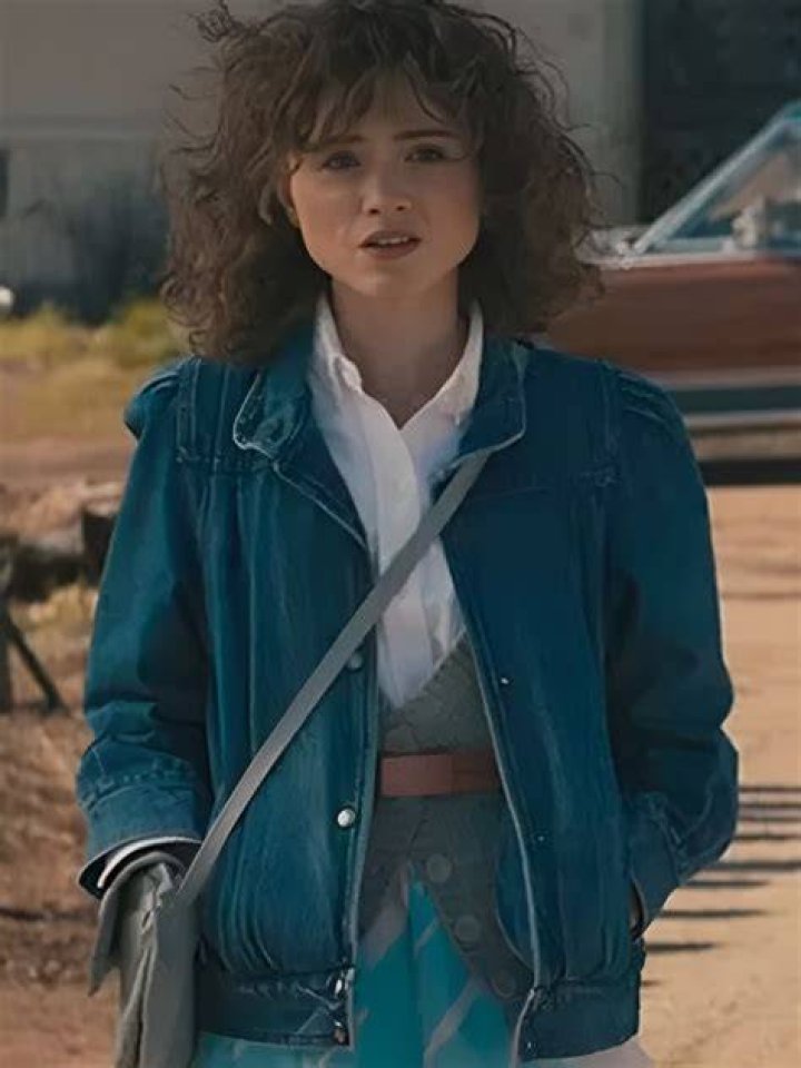 ‘Stranger Things’ Star Natalia Dyer Wears Cut-Off Denim Shorts & Outkast T-Shirt In NYC