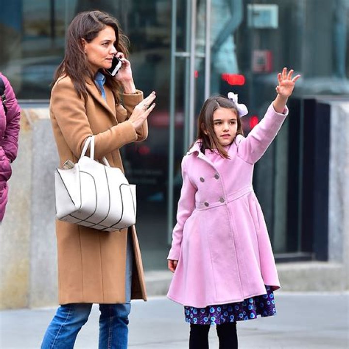 Suri Cruise, 16, Is Stylish In Puffer Coat & Jeans While Out With Friends In NYC