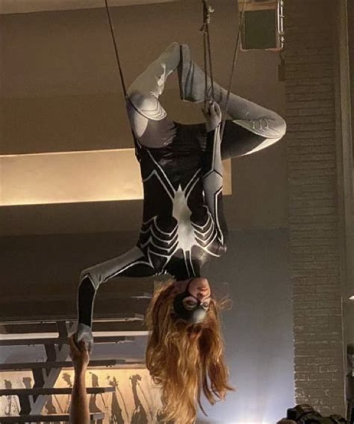 Sydney Sweeney Hangs Upside Down While Rocking Spider-Woman Costume in ‘Madame Web’ BTS Photos