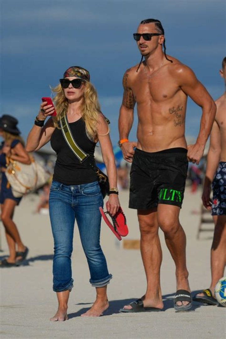 Teresa Giudice Latches Onto Her Shirtless Boyfriend While On The Beach In A Black Bikini — New PDA Pic