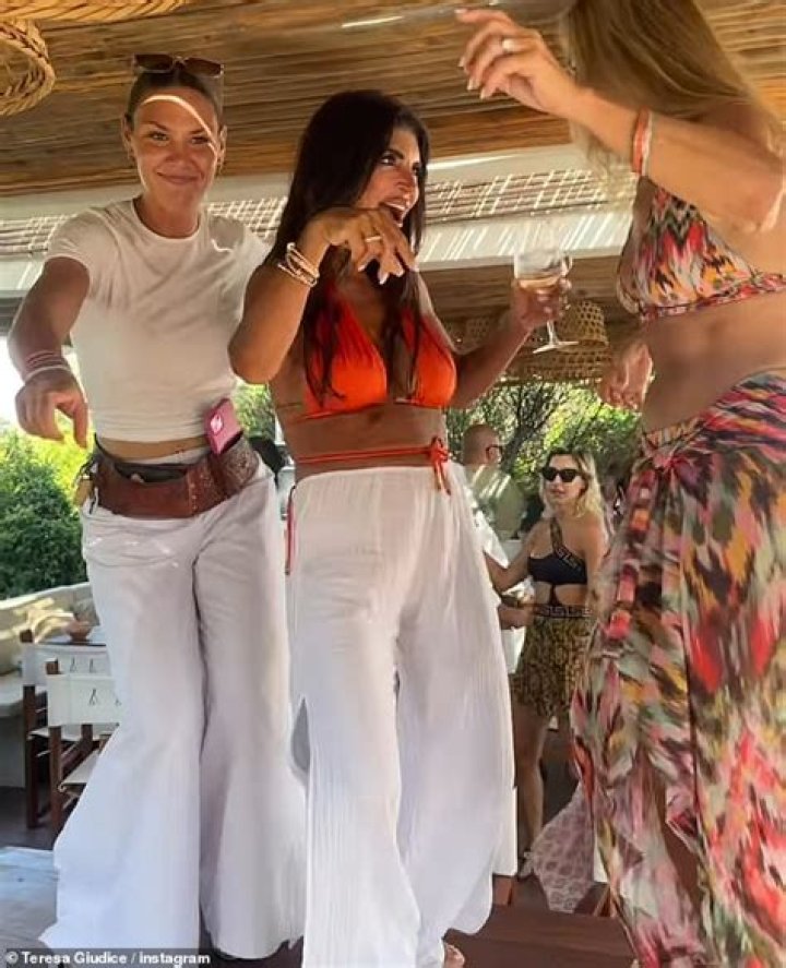 Teresa Giudice Stuns In Orange Bikini & Kisses Luis Ruelas In Italy: Photos & Video