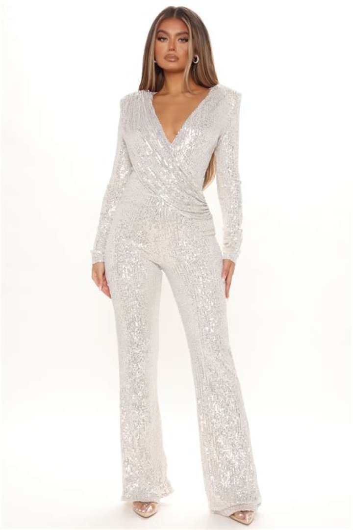 Tiny Harris, 45, Rocks Plunging Sequined Jumpsuit In ’70s-Inspired Look For Party With T.I. — Pics