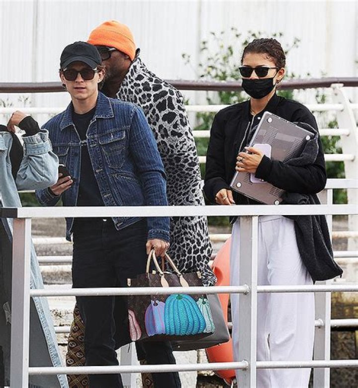Tom Holland Carries Zendaya’s $4K Louis Vuitton Bag Leaving Venice – Hollywood Life