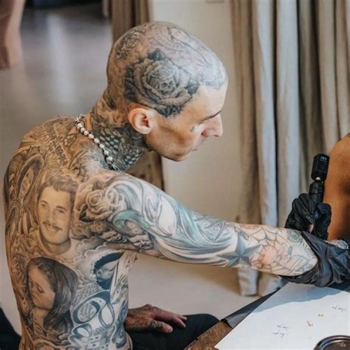 Travis Barker Defends His Many Tattoos After To Internet Troll: ‘I Look Awesome’